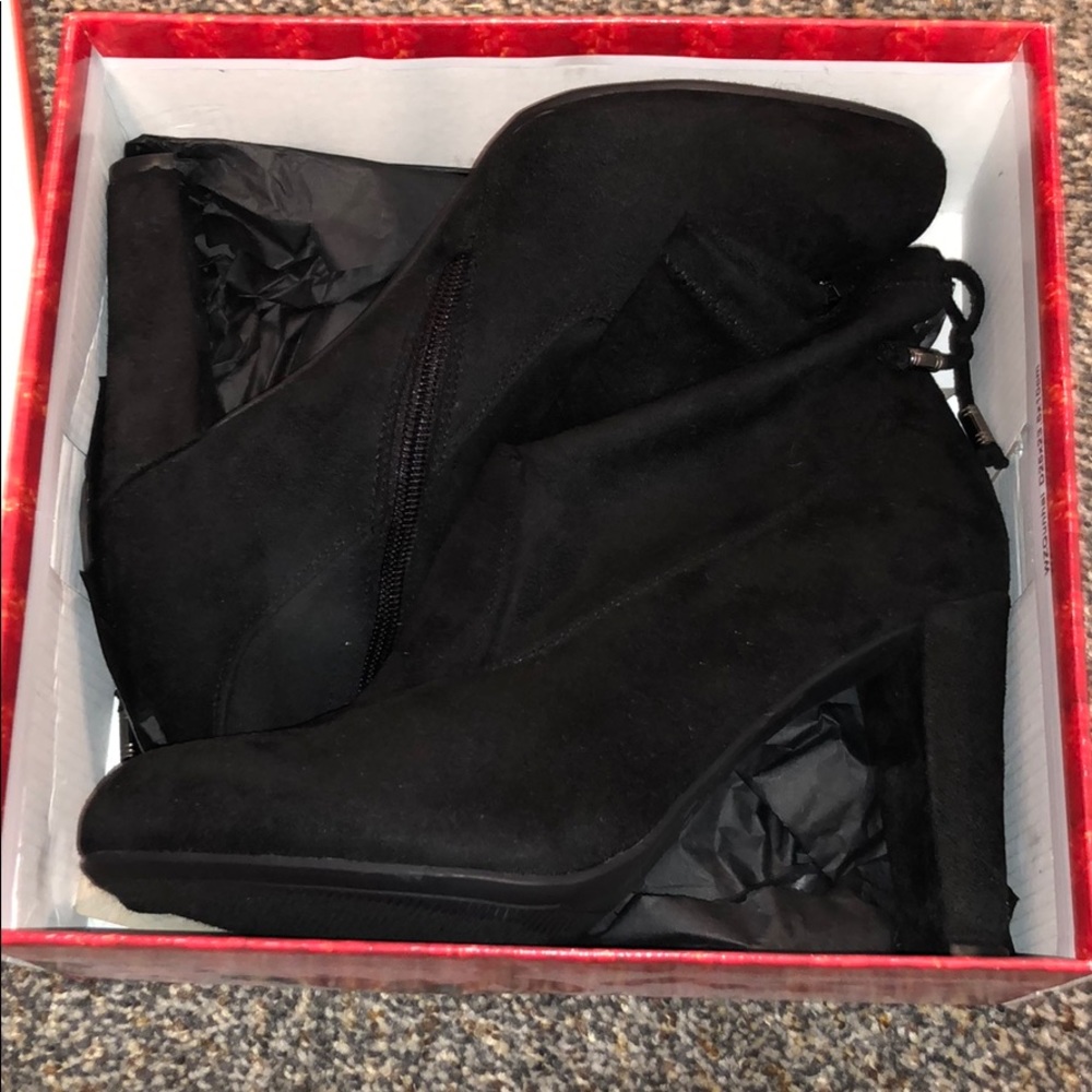 Brand new black booties still in box!